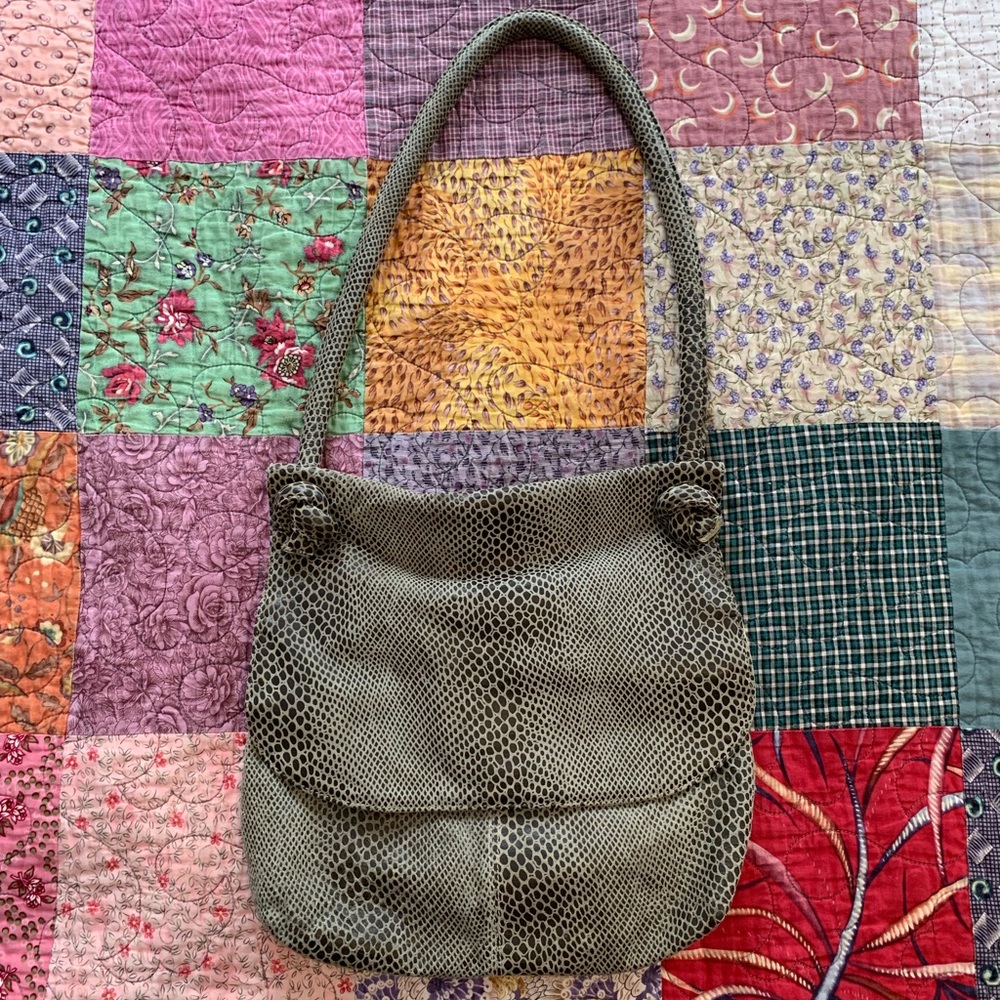 Studio imports funky soft faux alligator sack